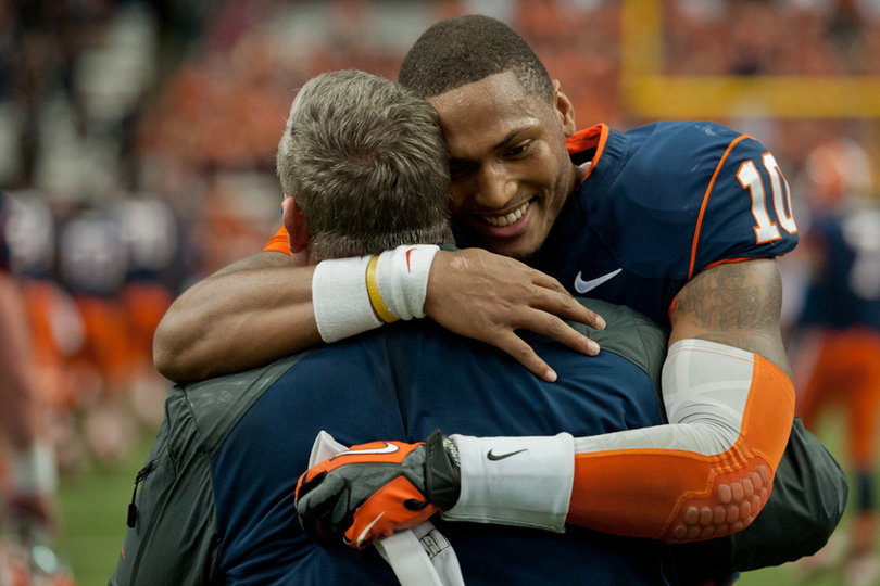 Hunt embraces Hicks in relief after the gut-wrenching victory. 