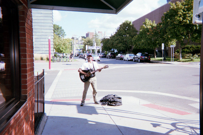 Interactive project randomly places disposable cameras, captures campus community