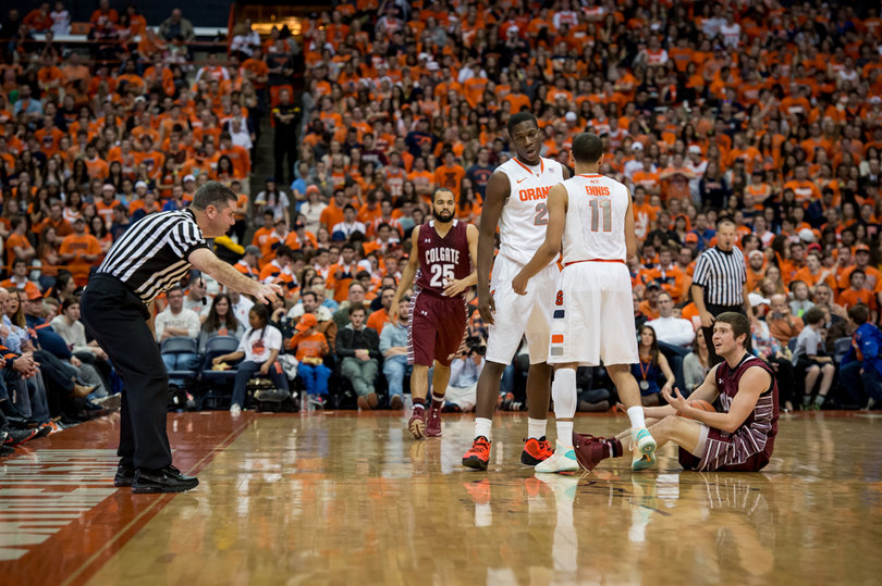 Freshmen Tyler Ennis and Tyler Roberson chat while Colgate contests a call. 