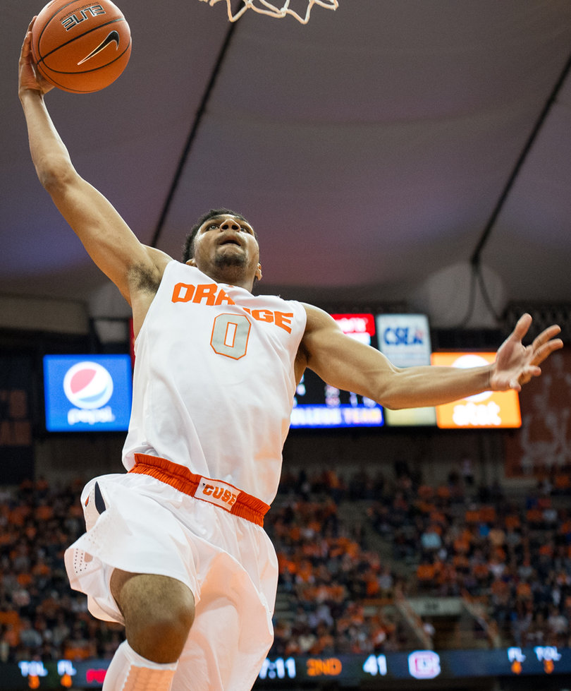 Gbinije rises up for an uncontested dunk. 