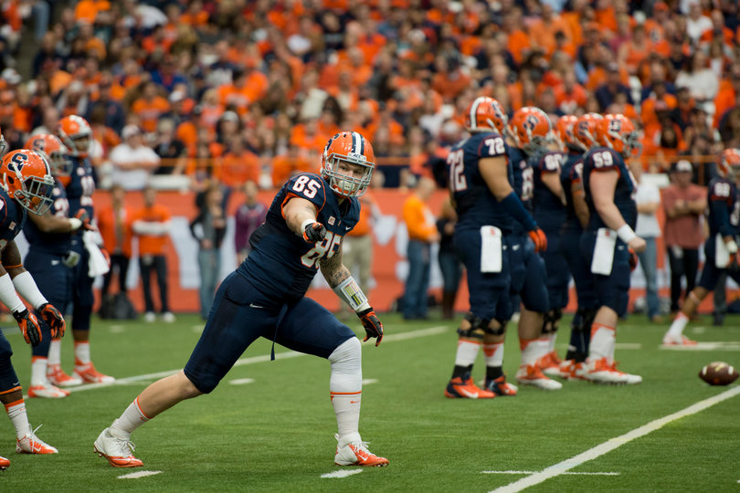 SU tight end Beckett Wales directs the offense out wide as the Orange's offensive line gets set.