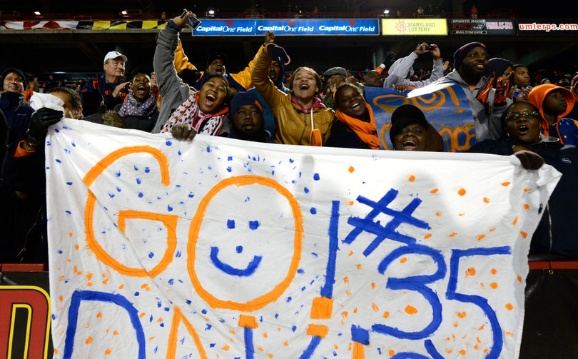 Dyshawn Davis' family celebrates and cheers for him. Davis finished with five tackles and one sack.