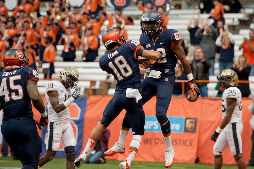 Cornelius celebrates with Clark.