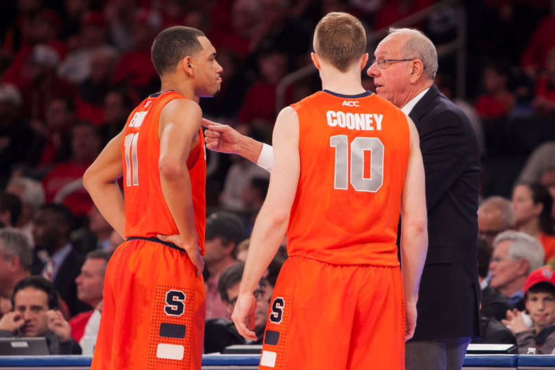 Jim Boeheim directs his starting backcourt during the first half. Syracuse led by as many as 14 in the opening frame.