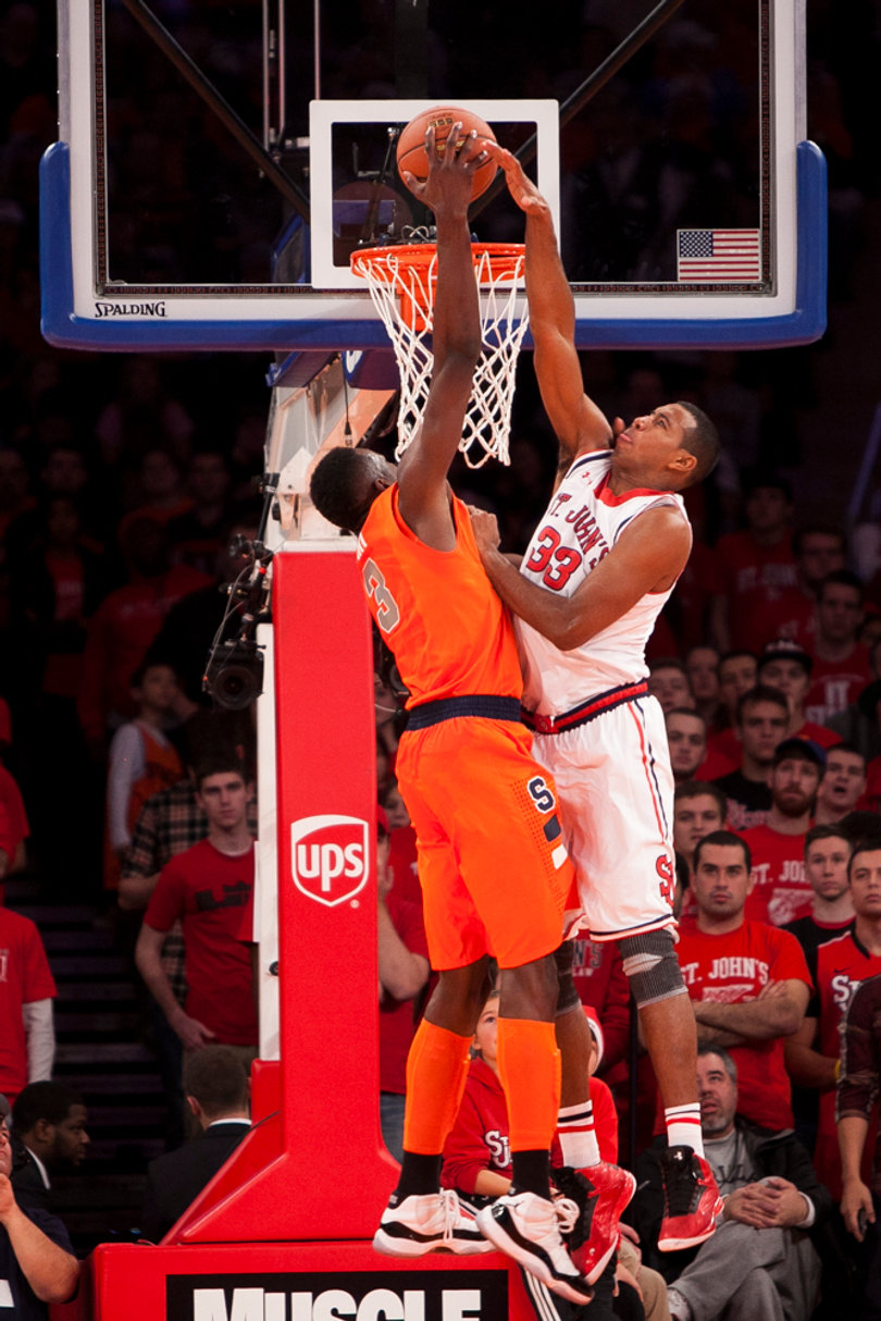 Jerami Grant throws down a thunderous dunk over St. John's forward Orlando Sanchez.