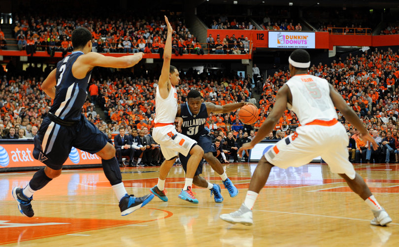 Dylan Ennis drives on brother Tyler Ennis.