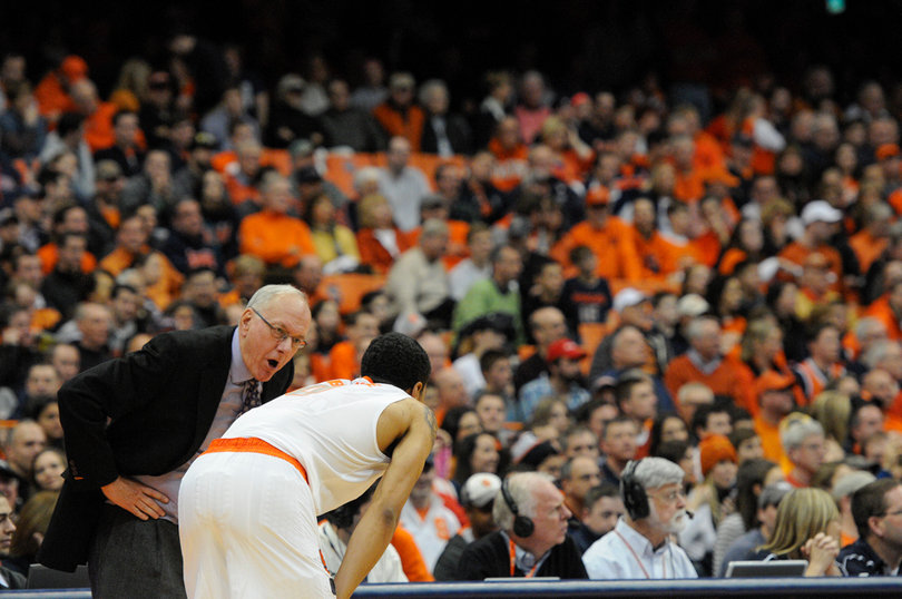 Jim Boeheim lectures Gbinije.