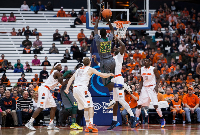 Baye Moussa Keita contests Glenn Bryant's shot attempt. SU held EMU to 31.5 percent shooting on the afternoon. 