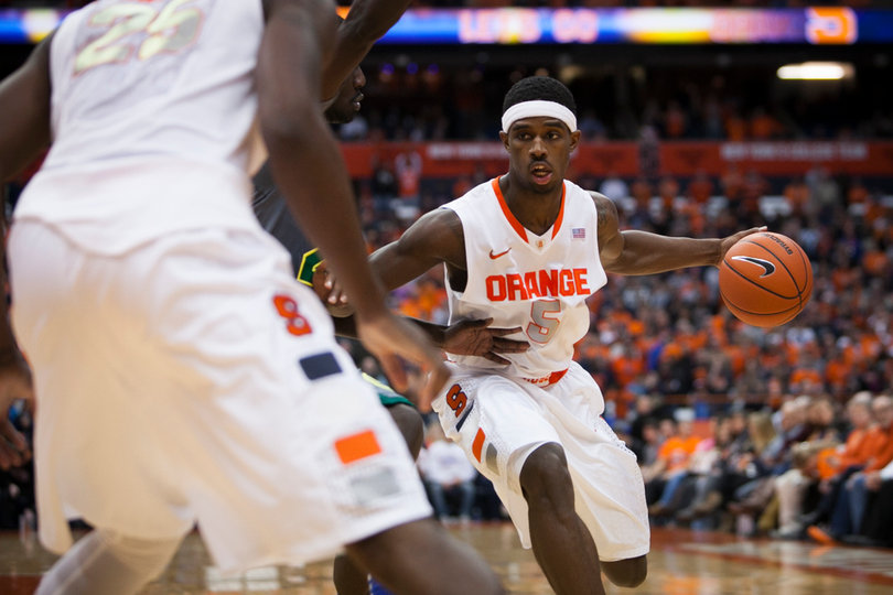 C.J. Fair drives against an Eastern Michigan Defender. Fair finished with 13 points and eight rebounds. 