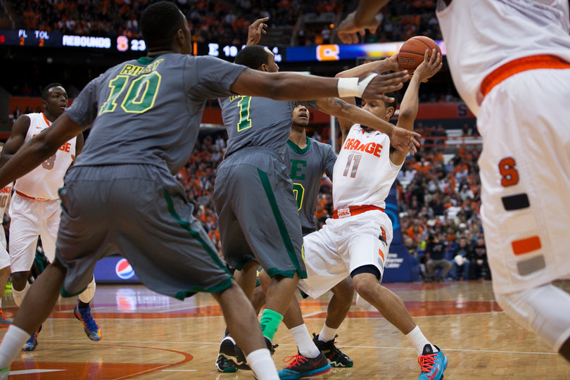 Ennis looks for an opening to pass.