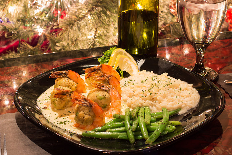  The stuffed shrimp includes six shrimp and is served with green beans and risotto.