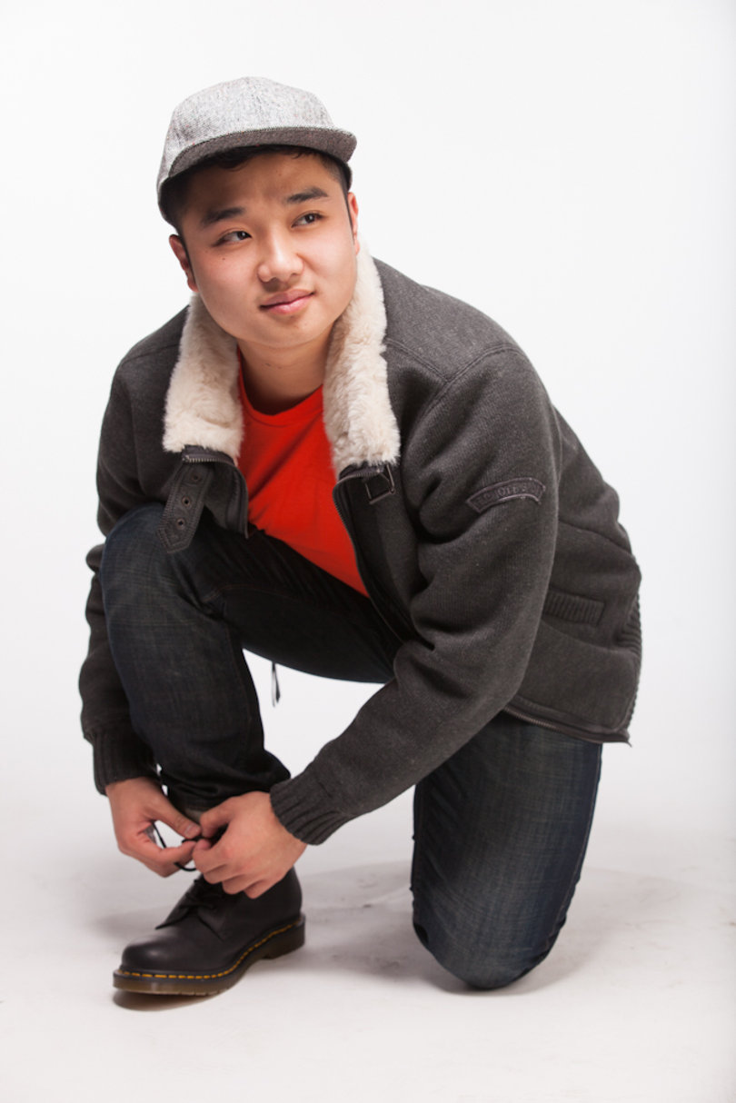 On Leo: Schott NYC sweater jacket ($200); American Apparel shirt ($17); Dr. Martens boots ($120); David and Young hat ($14)