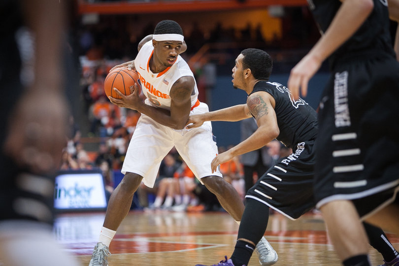 Fair works his way around High Point's defense, searching for an opening. 