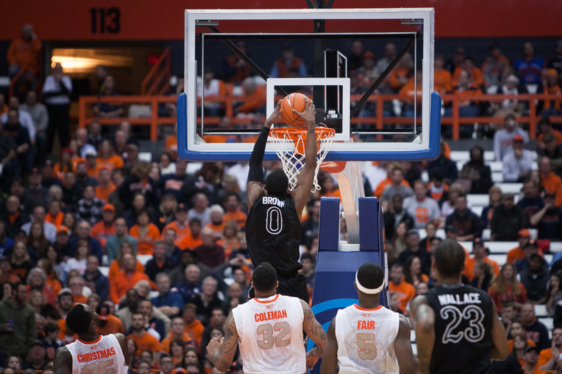 Brown dunks the ball late in the first half. 