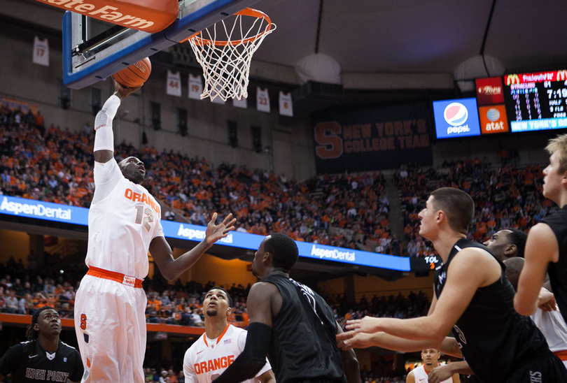 Keita goes for a shot in the paint. 