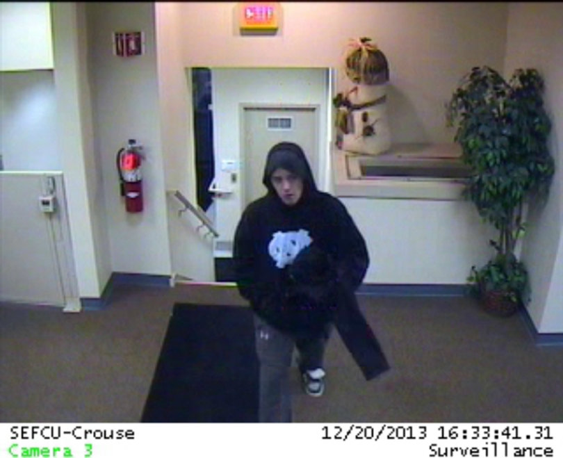 The Syracuse Police Department has released two photos of the suspected robber.