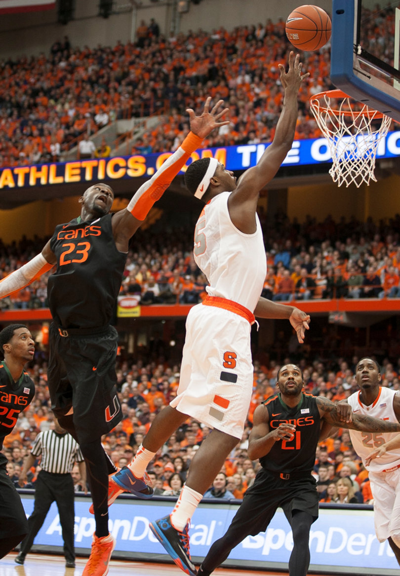C.J. Fair finishes a layup past Miami center Tonye Jekiri. 