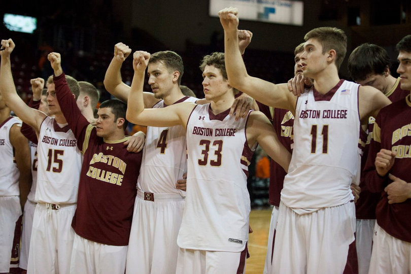 Boston College stands arm-in-arm and faces its crowd after a tough loss to a stingy Syracuse team. 