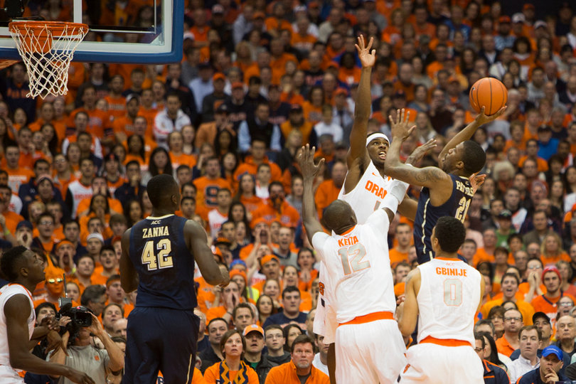 C.J. Fair and Baye Moussa Keita contest a Lamar Patterson floater in the first half of No. 2 Syracuse's game against No. 22 Pittsburgh on Saturday. 