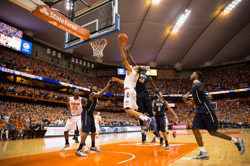 Ennis scores a pivotal basket against Zanna. Ennis led SU with 16 points and carried the Orange down the stretch.