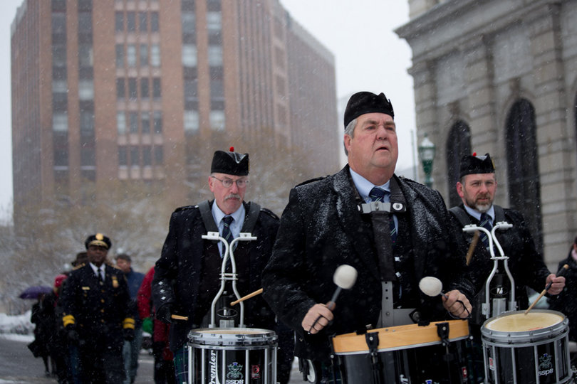 The Syracuse Scottish Bagpipe Band perform during the opening parade of Stephanie Miner's swearing in ceremony. Various church representatives, local poets and members of Miner's staff also took part in the opening procession.