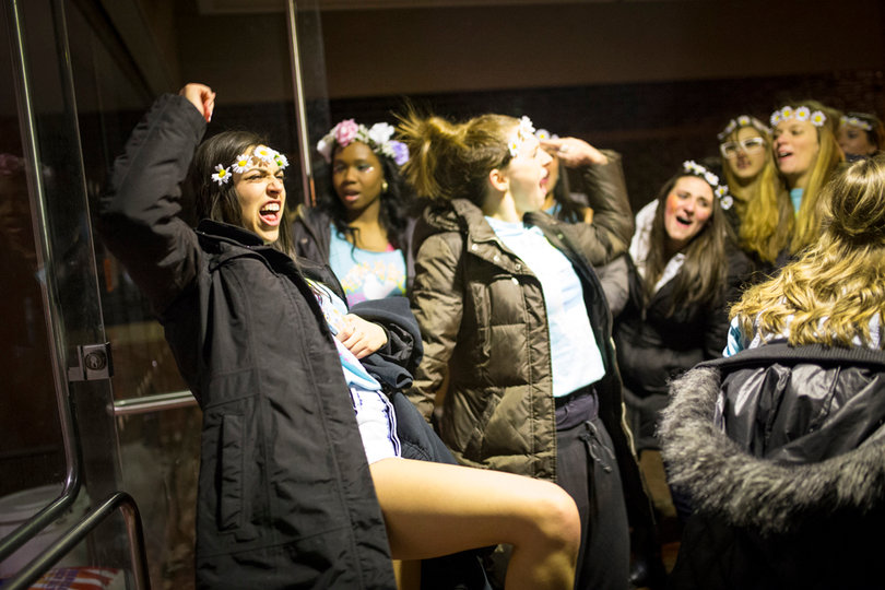 Tenley Bands, an Alpha Xi Delta member and senior biology major, leads her sisters in a chant. 