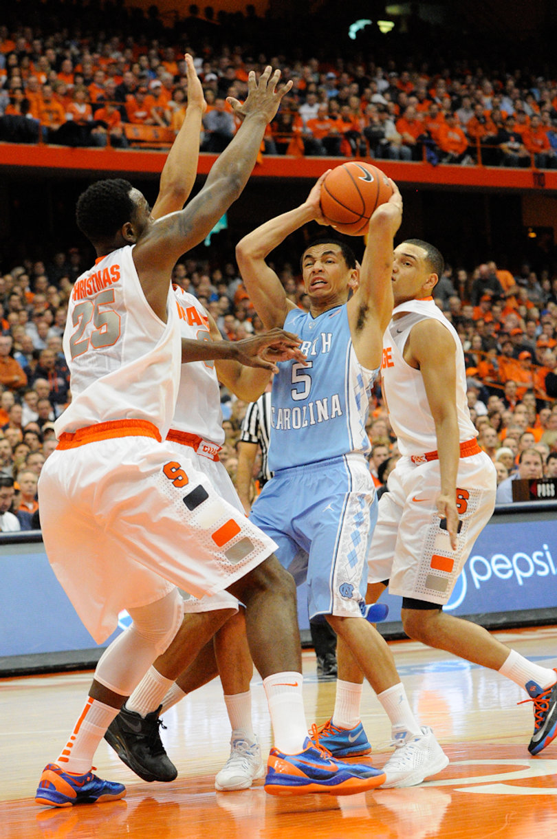 UNC's Marcus Paige looks for an opening, but ends up in a trap. North Carolina had a hard time finding a rhythm against SU's zone all afternoon. 