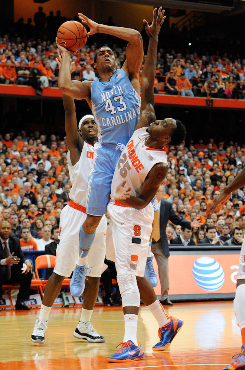 James Michael McAdoo goes for a shot over C.J. Fair and Rakeem Christmas. Christmas was a defensive stalwart throughout the game. 