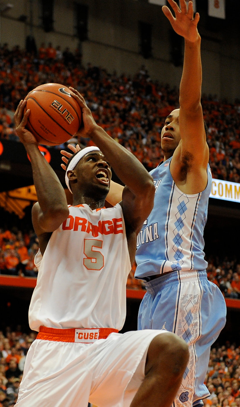 Fair goes for a shot in the paint but is stood up by a North Carolina defender.