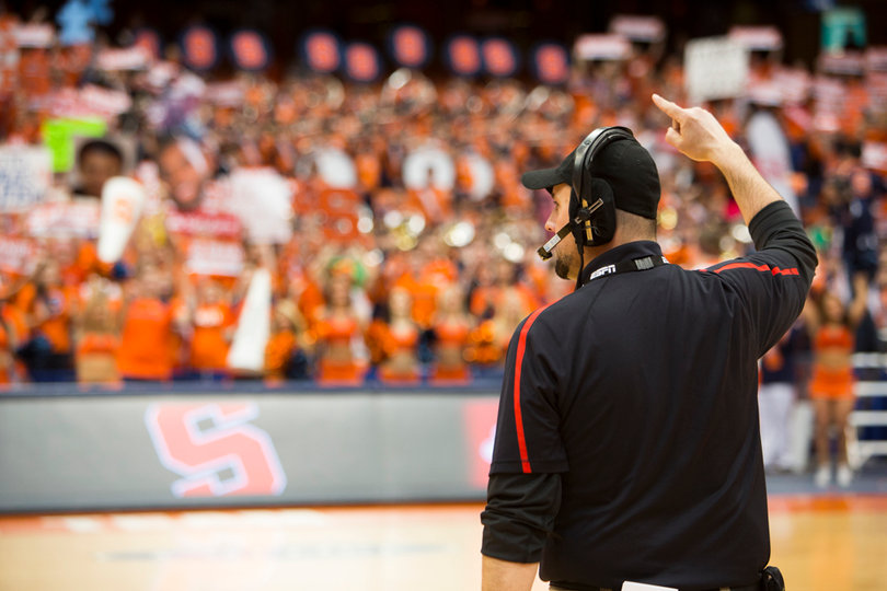 An ESPN crew member counts down to the beginning of the show. 