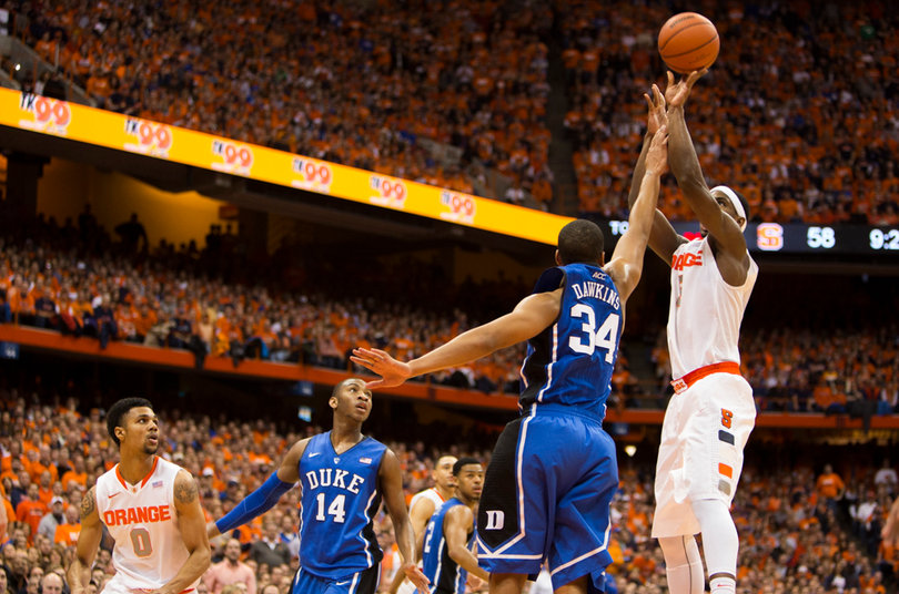 Fair elevates over Andre Dawkins and connects on a jumper.