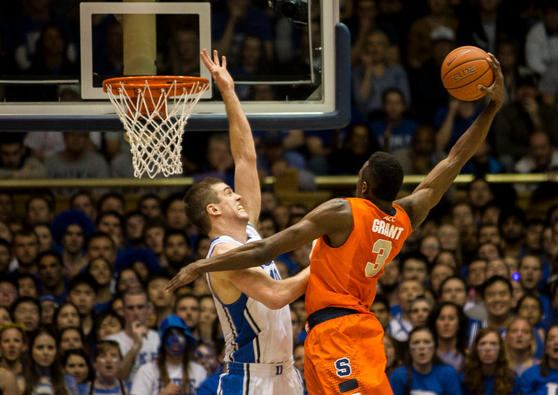 Jerami Grant rises up for a missed dunk over Marshall Plumlee. 