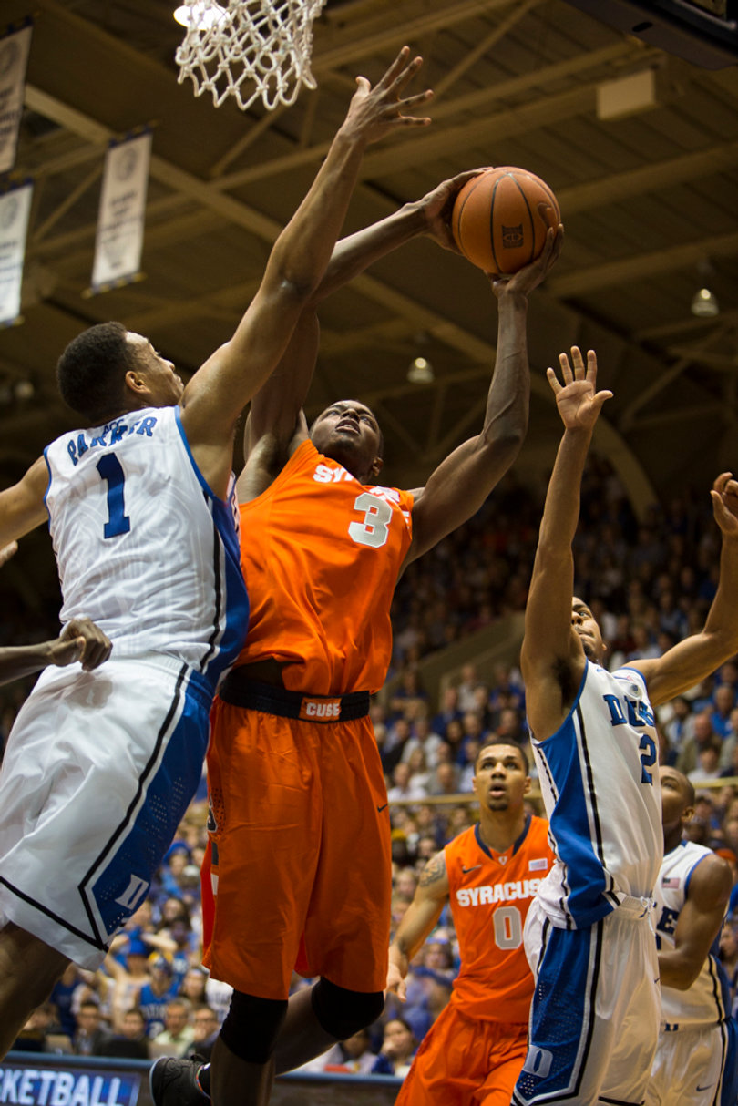 Jerami Grant takes on the Duke defenders for a basket.