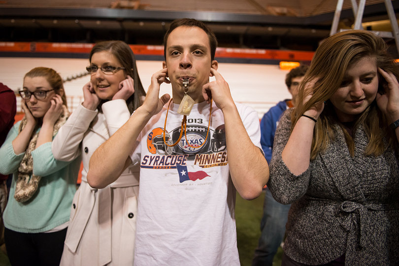 Jason Kammerer, a senior drum major, blows the final whistle during practice on Wednesday at the Carrier Dome.