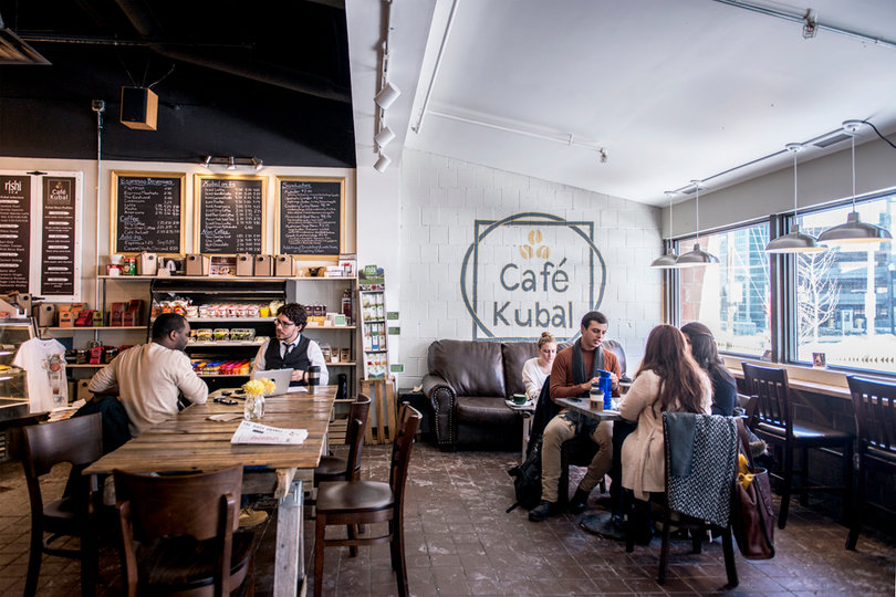Customers sit and relax at Café Kubal on the Hill on Wednesday. Danielle Lewis, an envrionmental and interior design major and a barista for Café Kubal was appraoched by owner Matt Godard to assist with redesigning the coffee shop.