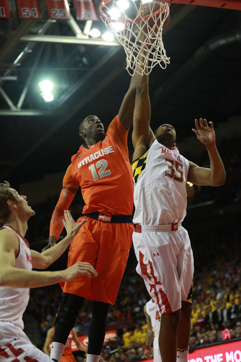 Baye Moussa Keita and Maryland's Damonte Dodd go up for a rebound. 