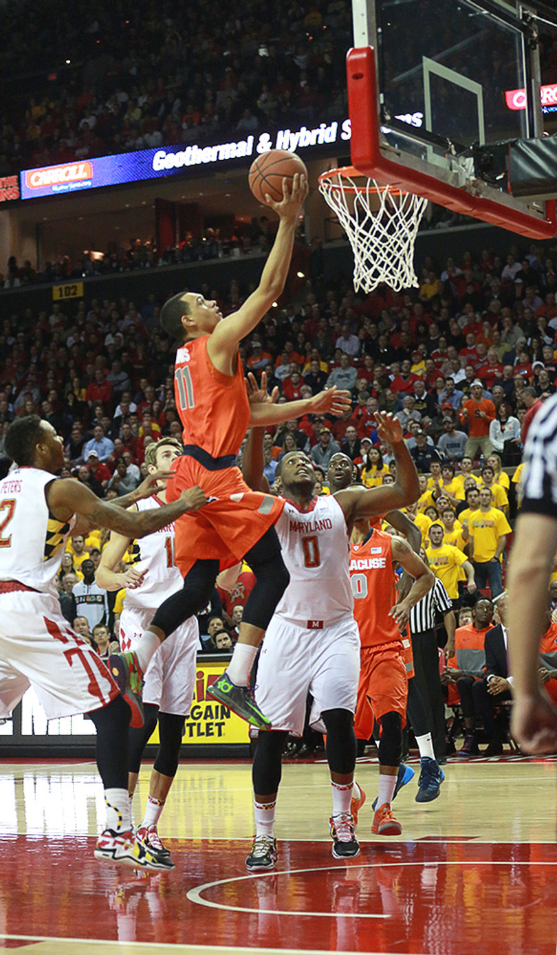 Tyler Ennis glides in for a layup, leaving a pack of Maryland defenders in his dust. 