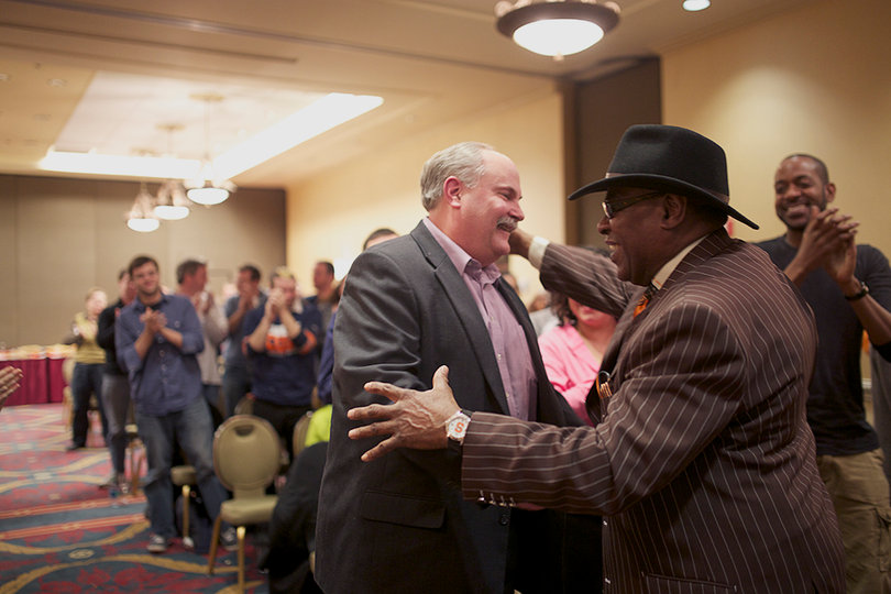 Bill Bleyle and Rick Wright embrace after Bleyle was inducted into the WJPZ Alumni AssociationHall of Fame. Bleyle was one of WJPZ's founding fathers, and graduated from SU in 1976.