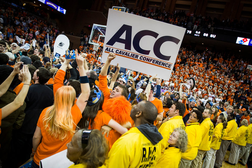 A Cavaliers fan holds up a sign that signifies Virginia's ACC dominance this season. 