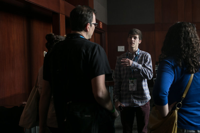 Avery Landau, UU's research director, talks with students and advisers from other college booking organizations. College booking organizations conduct research through surveys and focus groups to try and gauge what performers students want to see.