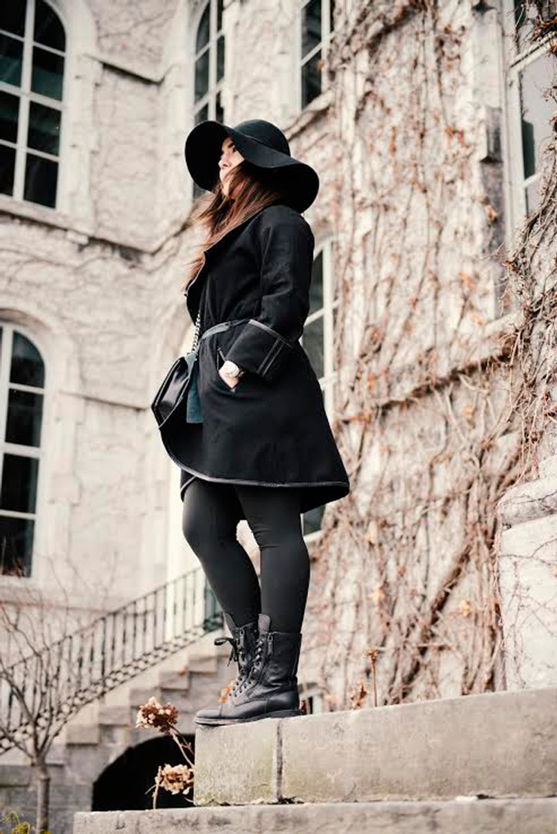 Talya Sever wears a Master GMT II Rolex watch paired with Chanel boots to show off her street style.