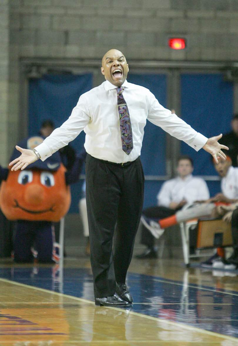 SU head coach Quentin Hillsman lets out a yell in his team's season-ending loss. The Orange captured the first tournament win in program history before falling to the Wildcats.
