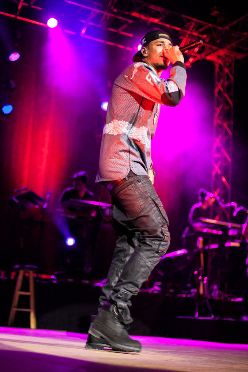 J.Cole performs "Blow Up" off of his mixtape "Friday Night Lights" in the Carrier Dome on March 21, 2014.