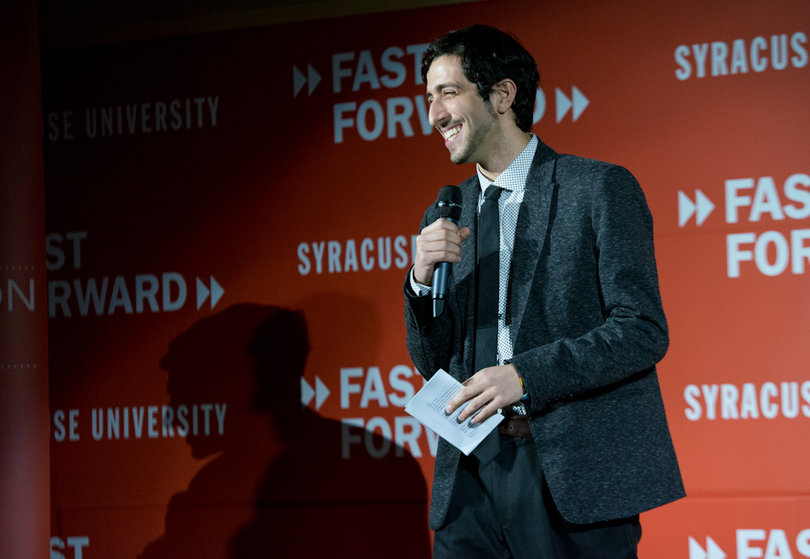 Nicholas Ferreiro, another winner of Fast Forward, makes the audience laugh with him as he presents his project, Cuse Comedy Collective. 