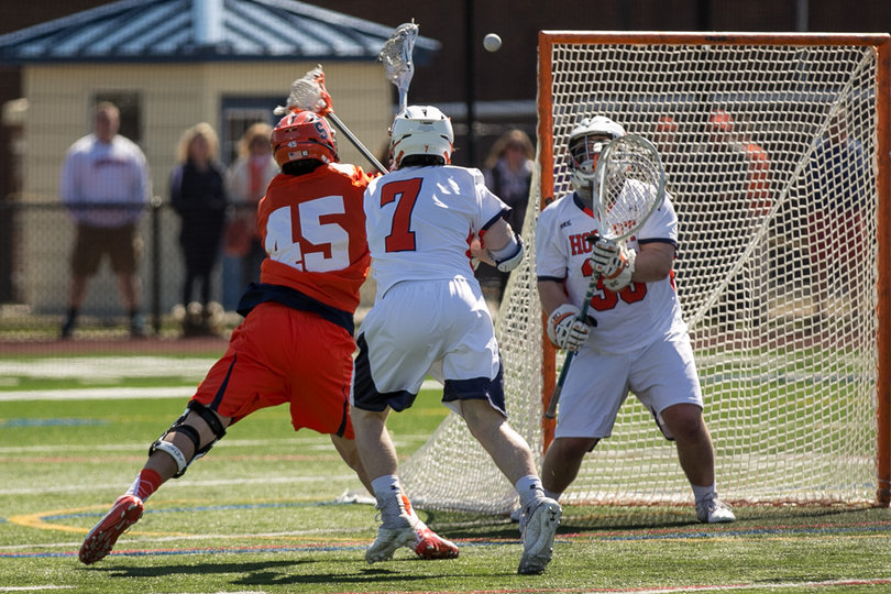 Orange attack Randy Staats gets off a shot from the left doorstep.