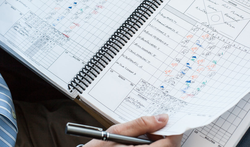 Benetti uses a variety of colors to keep a box score every game. 