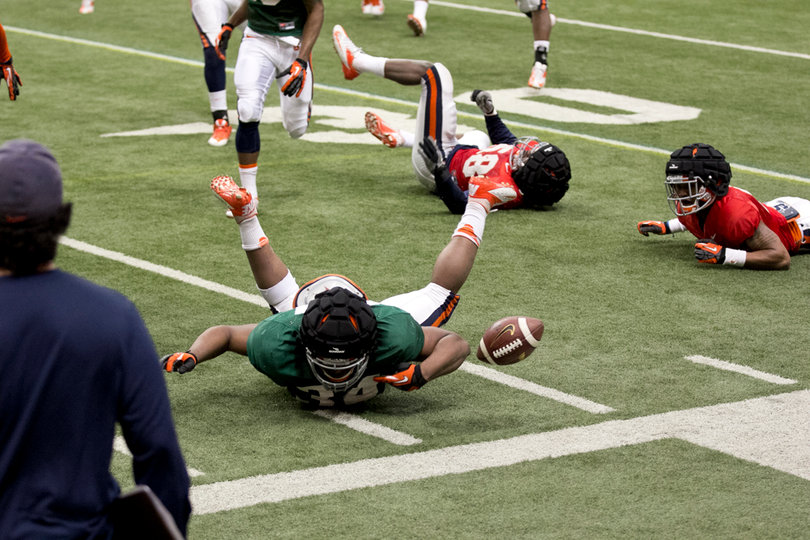 Ameen-Moore lets the ball out of his grasp after he was tackled. 