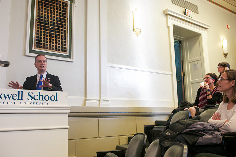 Chancellor Kent Syverud addresses senators at the last University Senate meeting of the year Wednesday in Maxwell Auditorium.