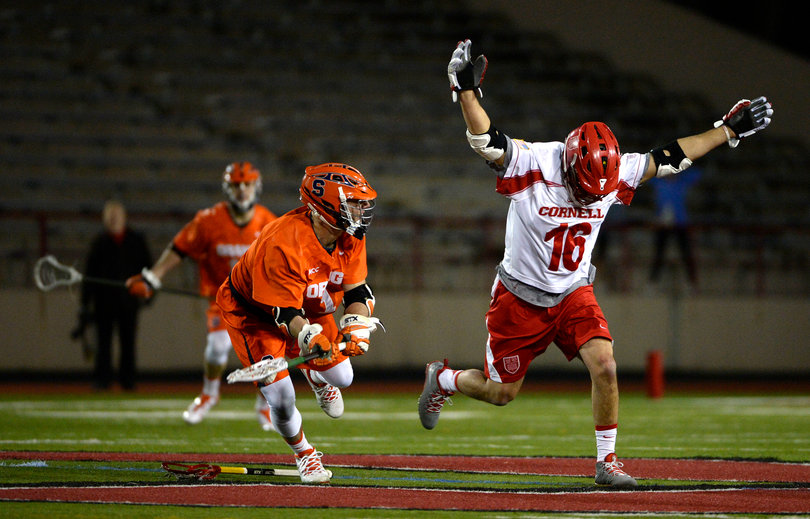 Cornell's Doug Tesoriero loses his stick and the faceoff against Daddio. 