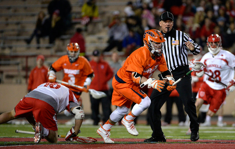 Chris Daddio bursts out of a clean faceoff win.  